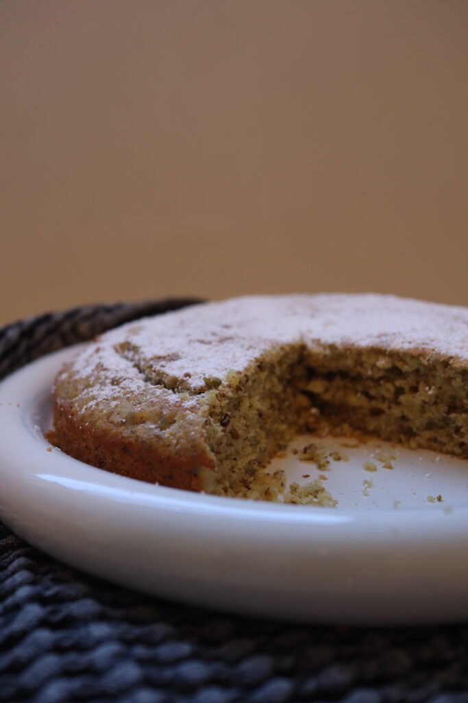 Pistachio lemon coconut olive oil cake side view