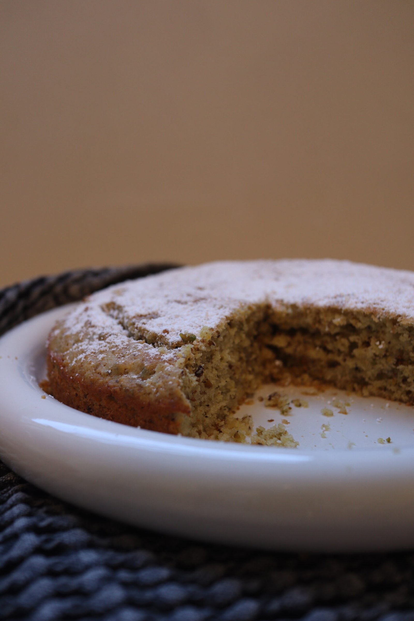 Pistachio Lemon Coconut Olive Oil Cake Pistachio lemon coconut olive oil cake side view