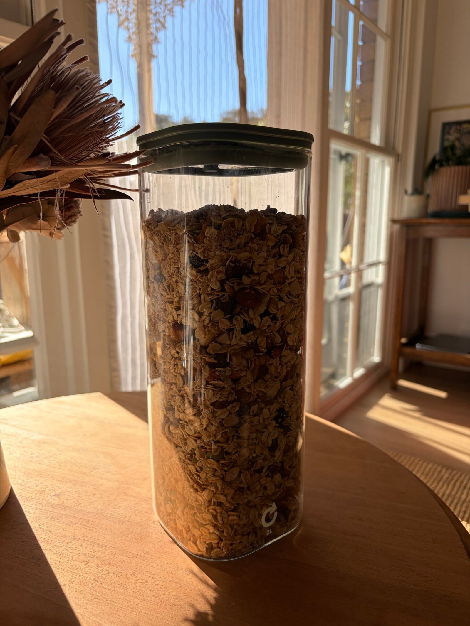 Lightly toasted muesli in glass container